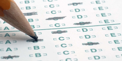 Pencil shading answer on exam answer sheet