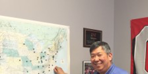 Li Shing Wang smiling