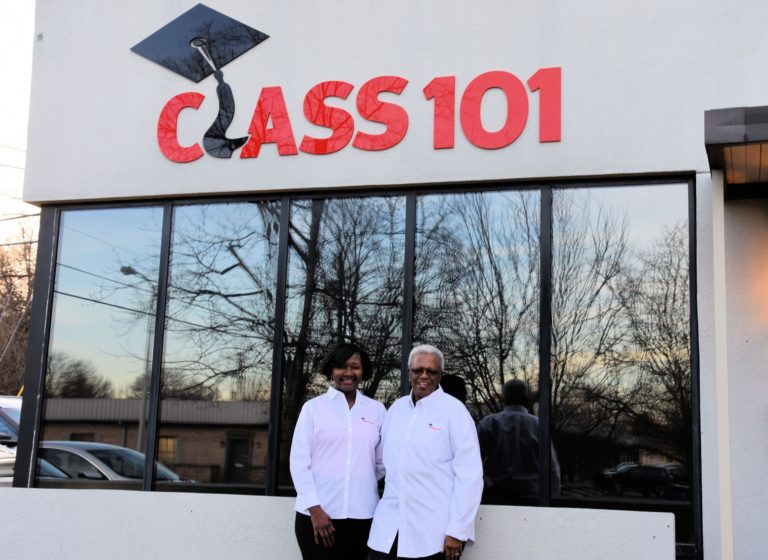 Man and woman in front of Class 101 building