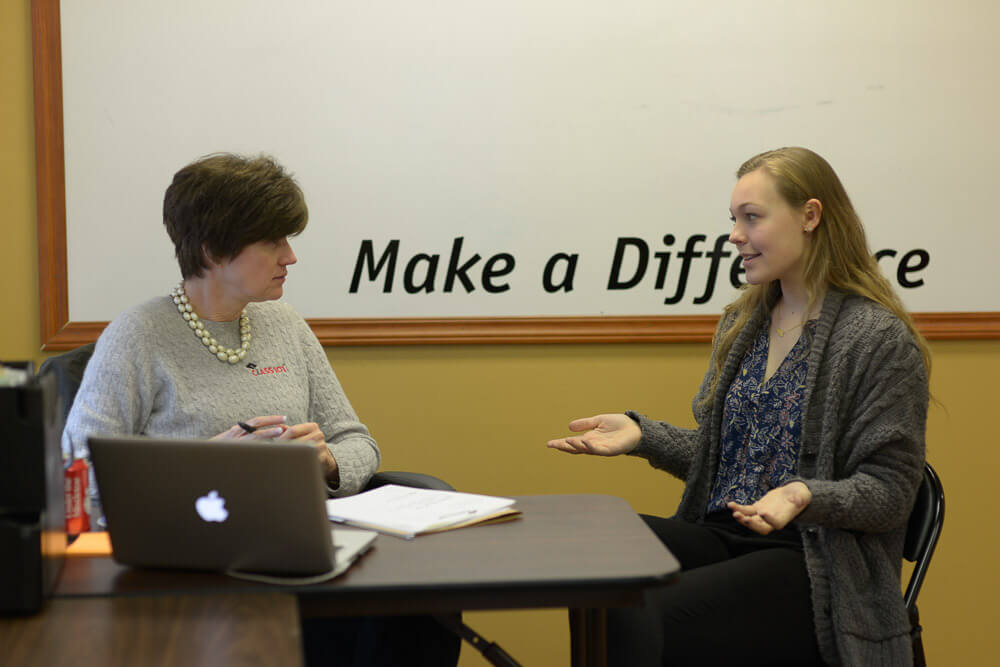 Two ladies discussing