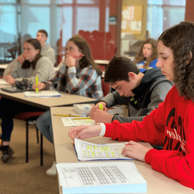 Students listening to the class