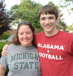 Mother and son smiling