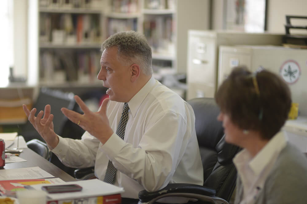 Man talking while making hand gesture