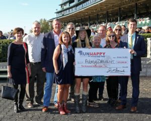 People holding a check